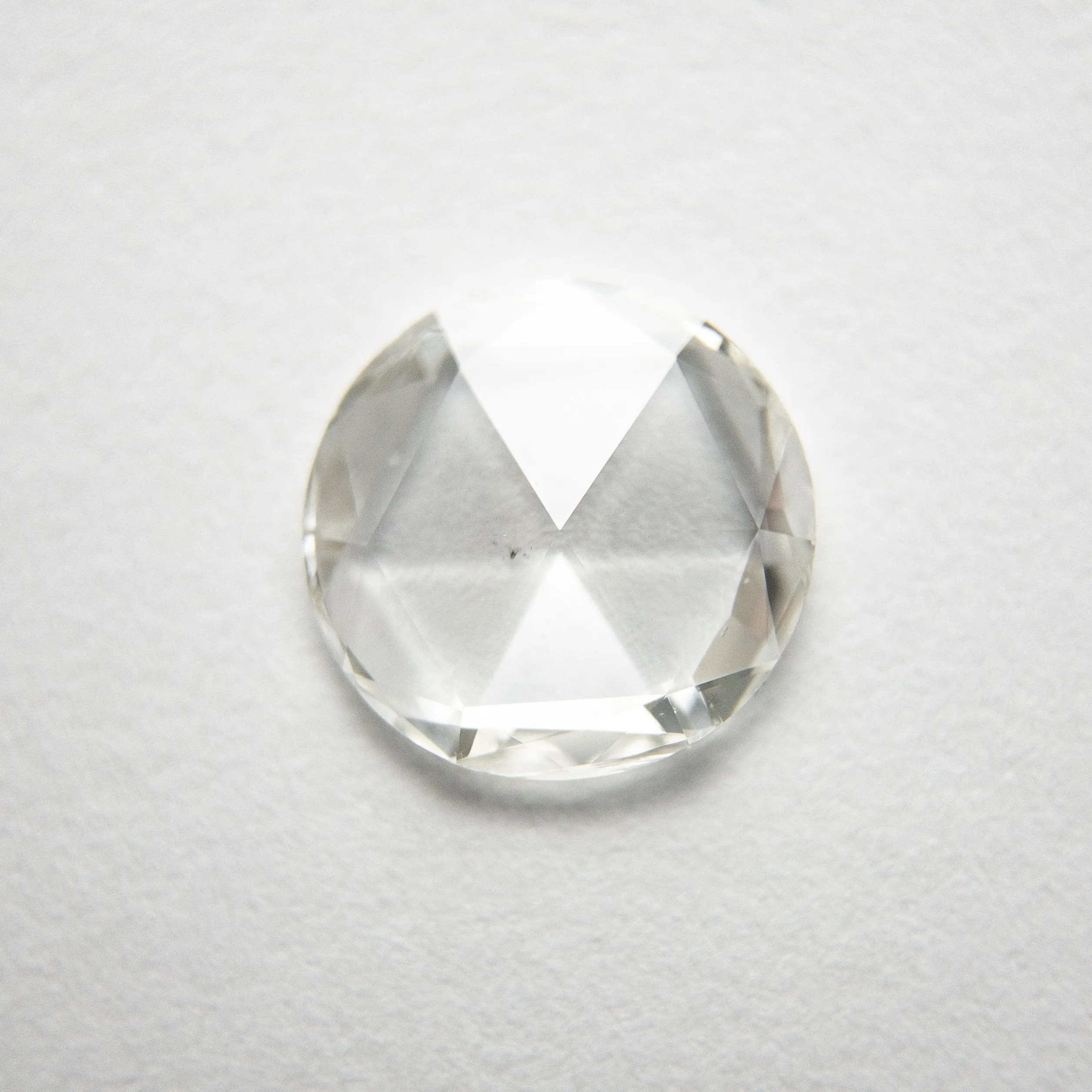 0.66ct 7.25x7.13x1.37mm SI1 H/I Round Rosecut 18284-01 Hold D1955