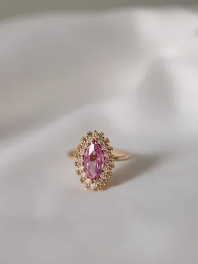 One-of-a-Kind Marquise Ring with a Unique Madagascar Sapphire and a Halo of Yellow Sapphires and Diamonds